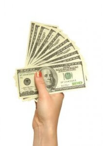 girl's hand with dollars